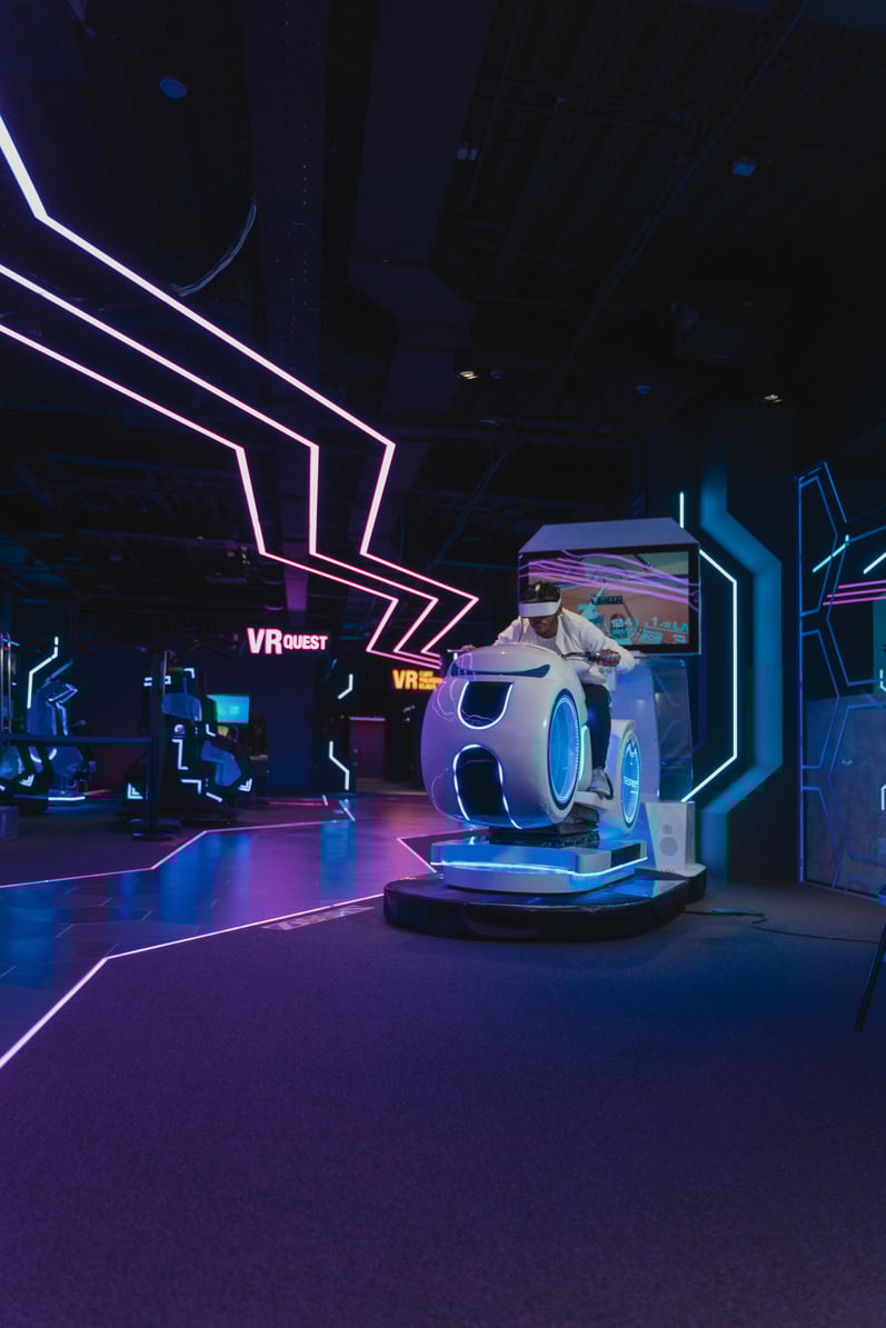 A Man Driving a Motorbike Simulator